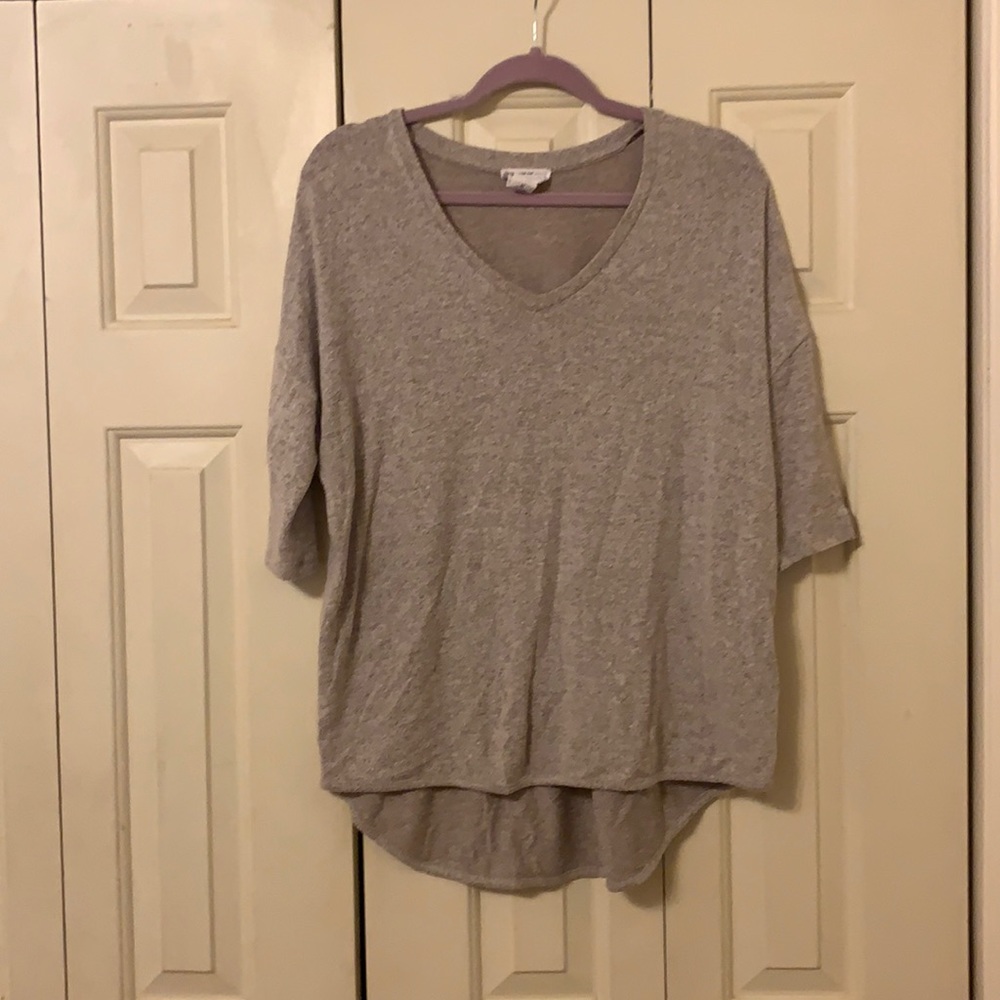 Light sweater, 3/4 length sleeves. Only worn a few times